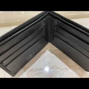 Louis Vuitton wallet black pebbled leather